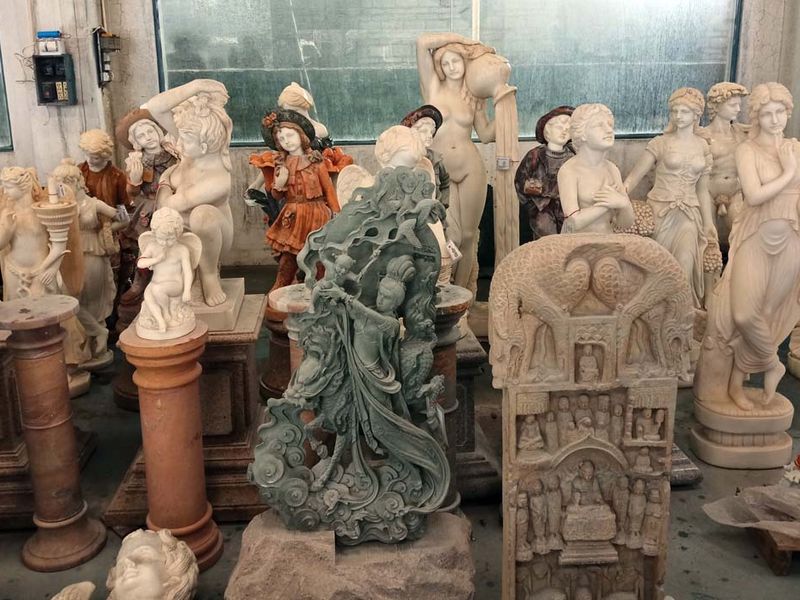 An assortment of granite and marble carvings at the Fujian Tenghui Stone factory in China.